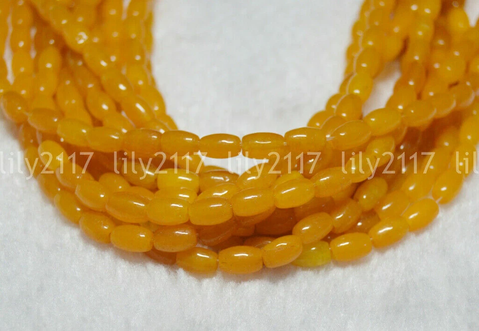 Venta al por mayor Cuentas sueltas amarillas de topacio natural de 5x8 mm con forma de arroz de 15" Foto 3 de 4