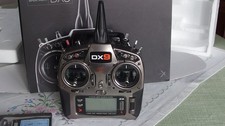 Spektrum DX9 Sender mit Senderpult und Sendergurt und 2 Simulator CDs