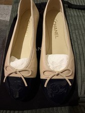 Chanel ballet flats in beige lambskin contrasting black patent calfskin cap toe