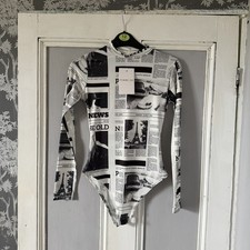 Femme Luxe Women’s Black And White Graphic Bodysuit Size 6