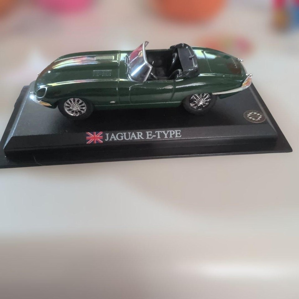 A 1:43 scale Jaguar E-Type in British Racing Green — one of the most beautiful cars ever made, now fits in your pocket.