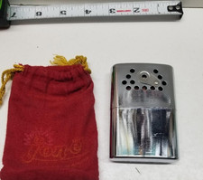 Vintage 1970 Jon-E 76 Hand Warmer Chrome Pocket Heater with Pouch  vent