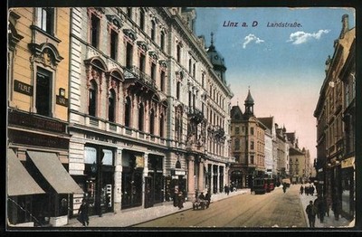 Ansichtskarte Linz a.d. Donau, Landstraße, Geschäfte, Straßenbahn 1915 