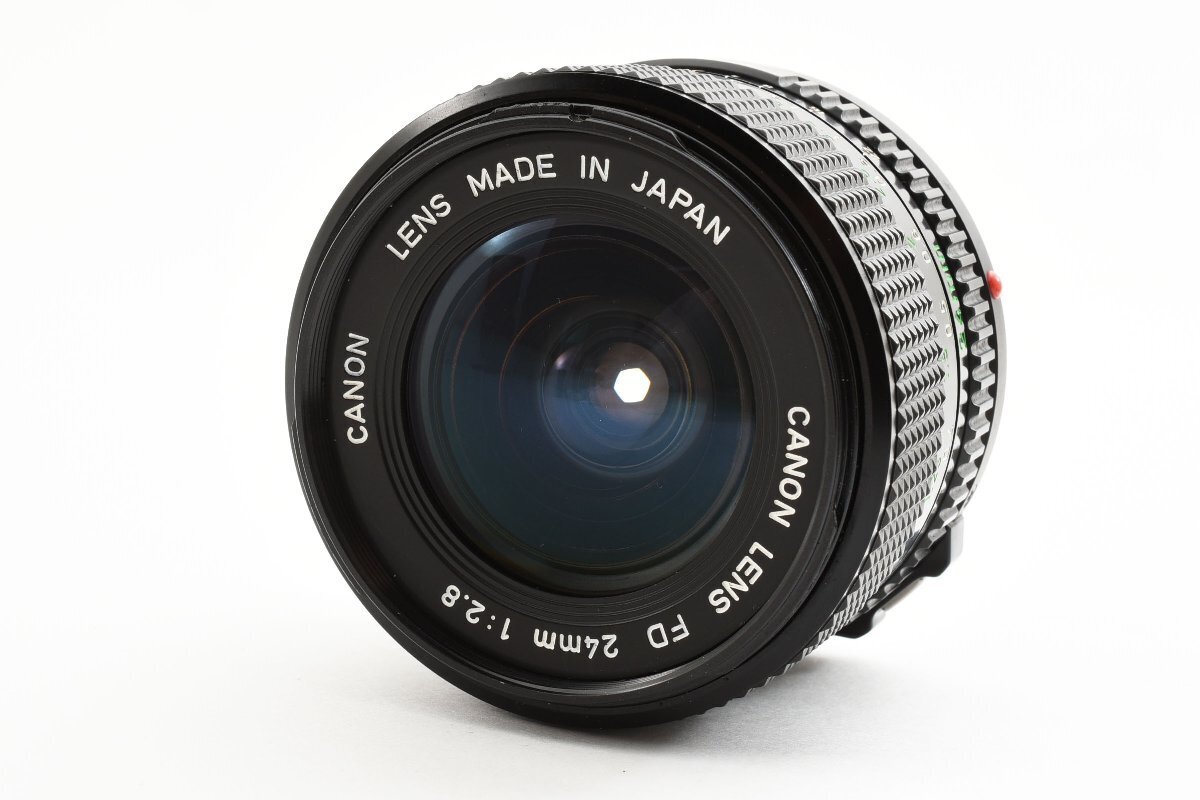 キャノン CANON NEW FD NFD 24 / 2.8 + BW-52C Canon New FD 24mm f/2.8 Wide Angle MF Lens FD Mount [Good