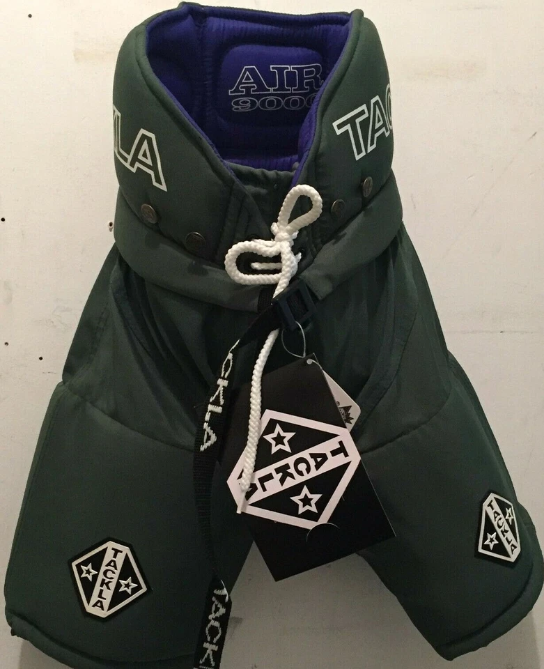 Pantalones de hockey sobre hielo verde oscuro con etiquetas de Tackla Foto 3 de 4