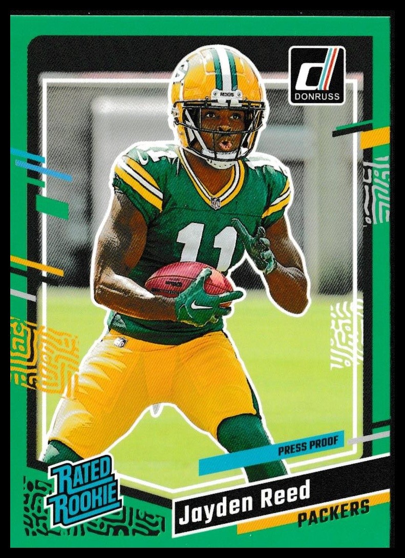 2023 Donruss #334 Jayden Reed Press Proof Green