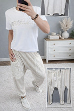 38 40 42 Baggy Boyfriend Joggpant Hose tief geschnitten Gold schimmernd spitze