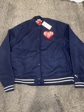 Paquete de pegatinas Puma chaqueta universitaria para hombre XL Puma azul marino 632832-01 precio de venta sugerido por el fabricante $200 nuevo con etiquetas