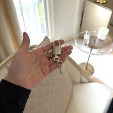 Louis Vuitton Silver Padlock & Key Set