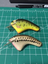 TWO VINTAGE POTBELLY CUSTOM BALSA SQUAREBILL LURES THAT NEED ATTENTION