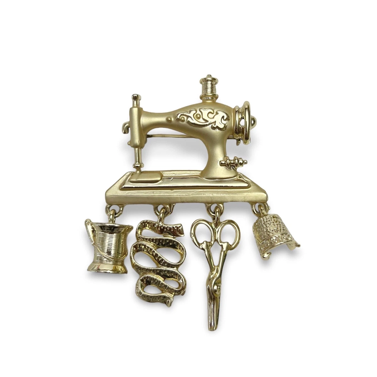 Sewing machine best sale brooch