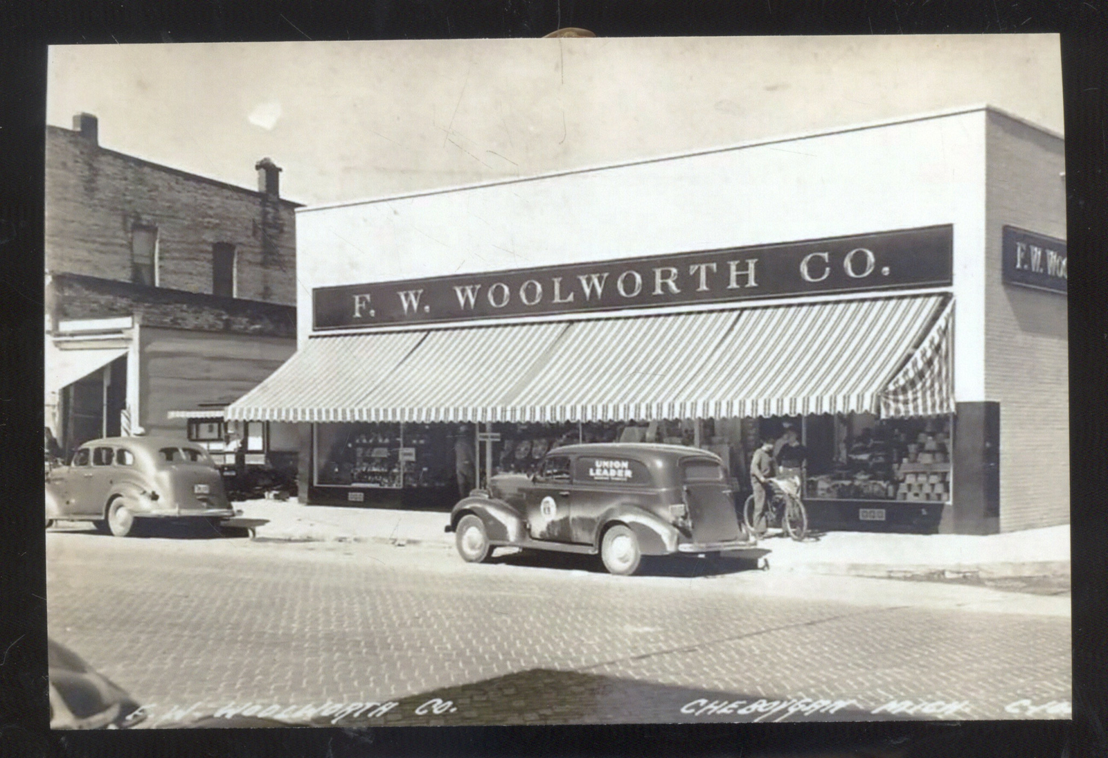 REAL PHOTO CHEBOYGAN MICHIGAN WOOLWORTH STORE OLD CARS POSTCARD COPY eBay
