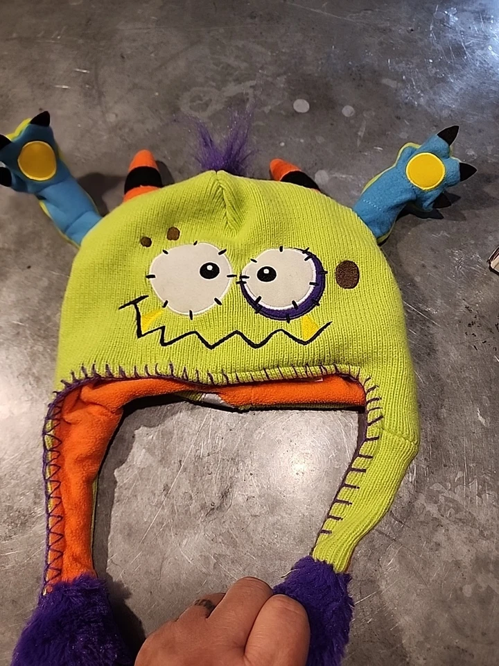 Sombrero verde Flipeez Peek-a-Boo Monster con brazos móviles Foto 2 de 4