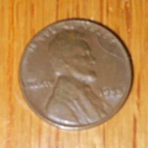 Wheat Penny 1955, no mint marking, error “L” in LIBERTY on rim