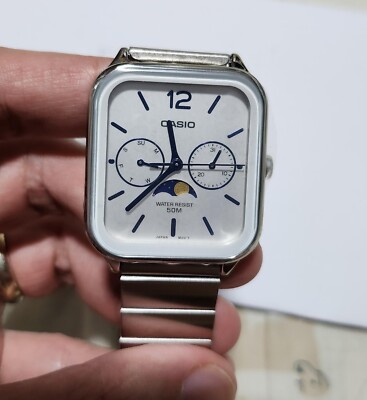 Casio MTP-M305D-7A White Analog Moon Phase Classic Lunar Design