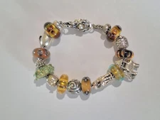 Trollbead LAA 925 bracelet 7 1/2 inch with 17 charms pearl lock