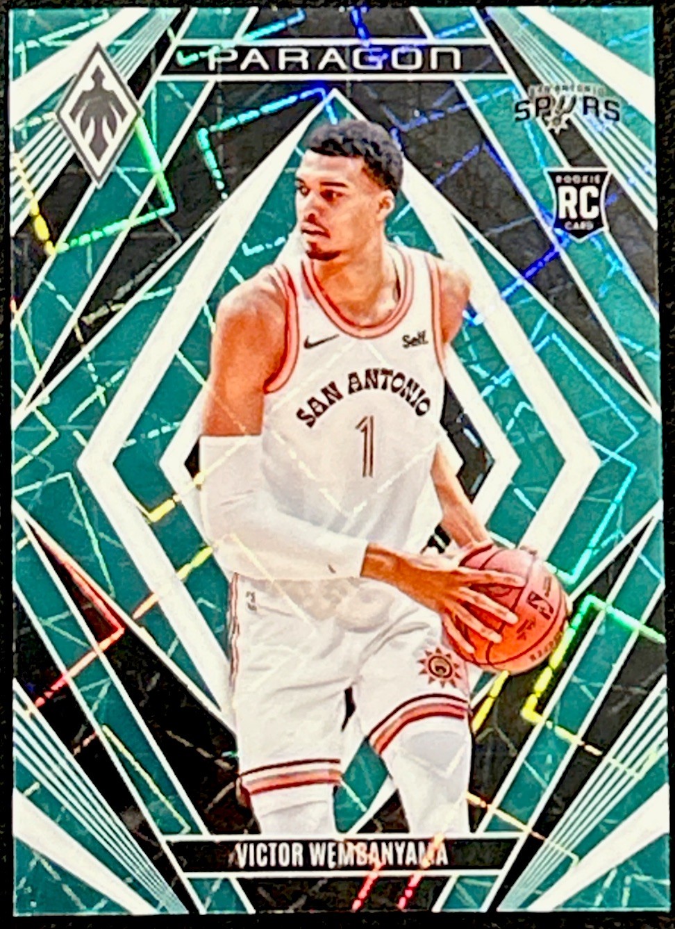 2023-24 Panini Phoenix - Victor Wembanyama #13 Paragon Teal Lazer (RC) Spurs