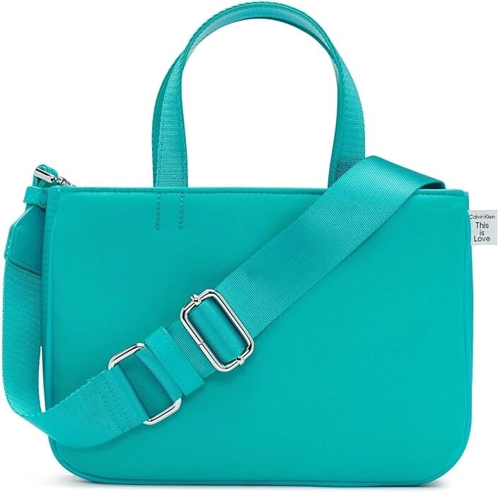 BOLSO BANDOLERA BOHO CON CORREA DE GUITARRA CALVIN KLEIN POLI TURQUESA $117 NUEVO CON ETIQUETAS