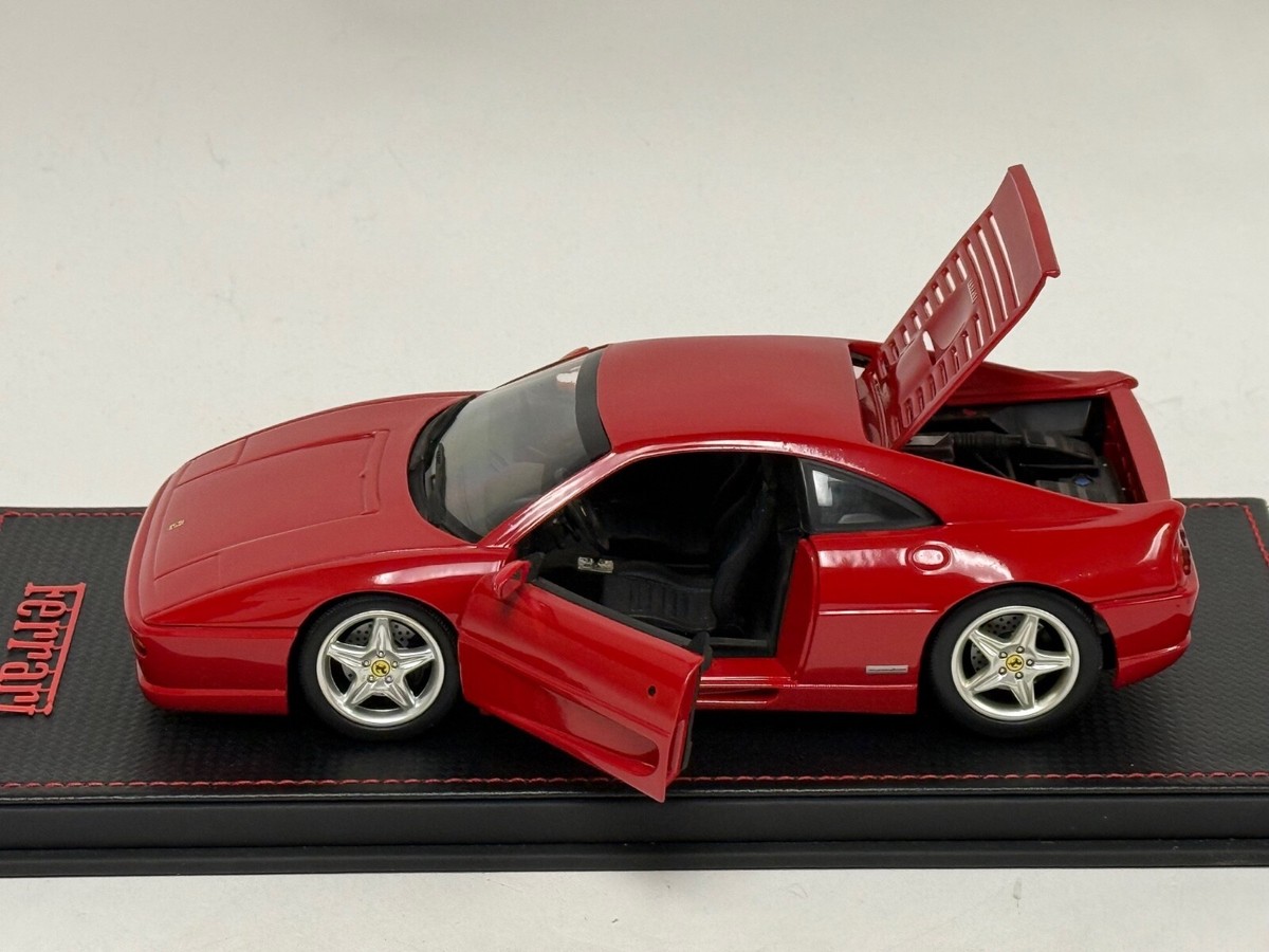 1/18 Hot Wheels Ferrari F355 Berlinetta in Red set on Leather base