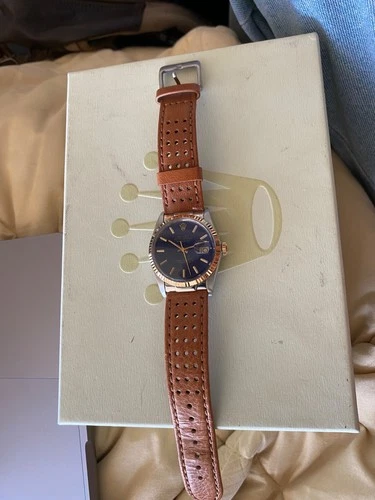 Rolex Oyster Perpetual Datejust 18K gold Bezel Blue Dial.  No box or papers.