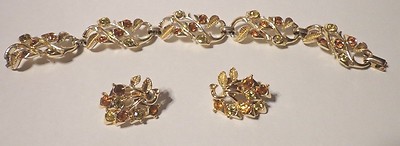 Coro Hallmarked gold Tone with Rhinestones bracelet and Clip earring set. 
