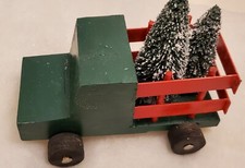 Christmas decoration, hand made wooden truck. Painted with rolling wheels.