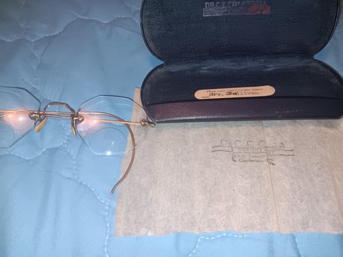 Vintage eyeglasses. Original dust cloth and case. Gold. Excellent condition.