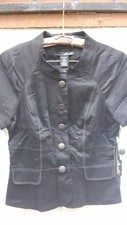 A NEW SHORT SLEEVE BLACK JACKET