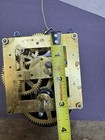 E. Ingraham Co. Clock Mechanism  with Pendulum Rod. Pend hangs above movt. — photo 7