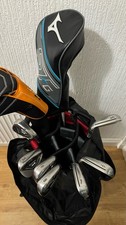 TaylorMade M4 irons, Mizuno driver, Mizuno 3 wood and TaylorMade golf bag