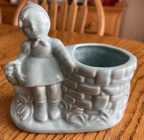 Vintage Shawnee Girl With Flower Basket  Sitting At Well Planter Blue