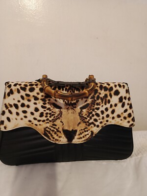 Gucci Bambus mit Leoparden.
