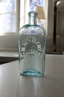 M. McPhelemy Danbury Conn. 1/2 Pint StrapSided Flask