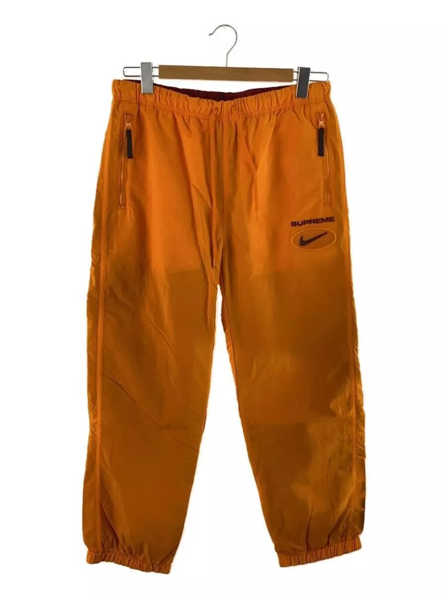 Pantalon Nike Supreme nylon orange S occasion