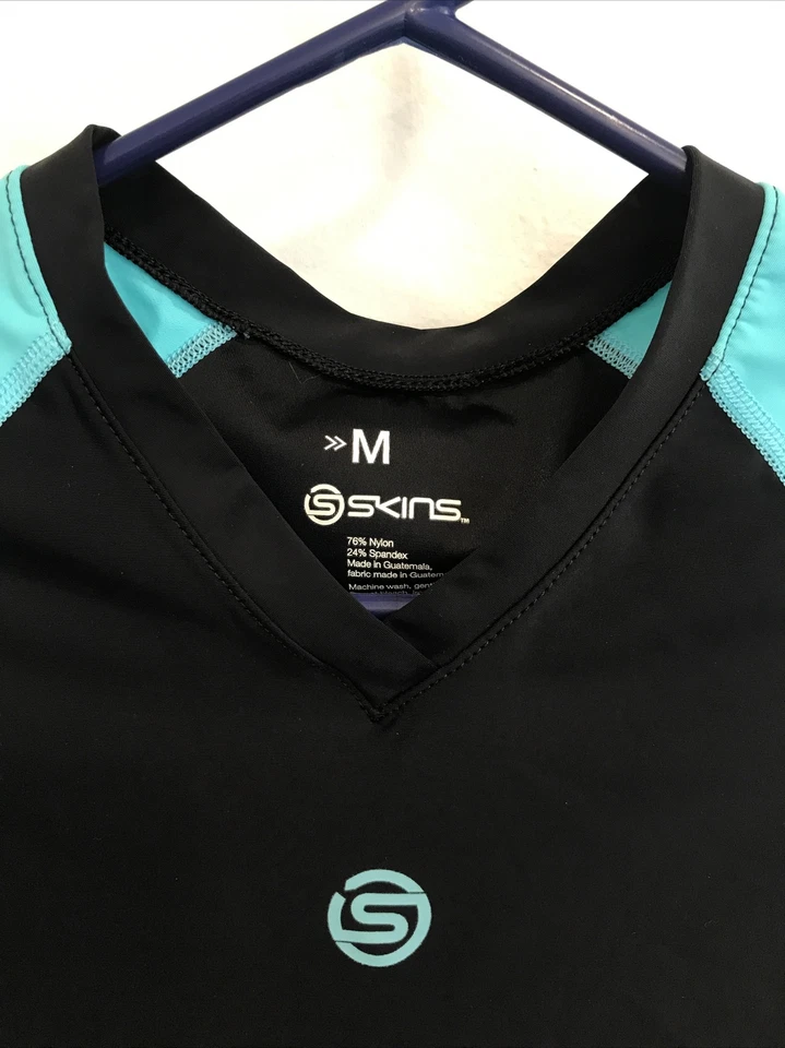 Camisa de ciclismo Skins manga larga negra azul talla juvenil M Foto 3 de 4