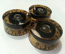 4 Guitar speed volume/tone knobs.. Black/ Gold Flake. JAT
