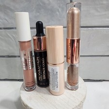 Revolution Makeup Bundle: Foundation, Highlighter, Eyeshadow, Lip Gloss