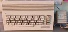 COMMODORE 64 CON ALIMENTATORE TESTATO E FUNZIONANTE TESTED GOOD WORKING ORDER