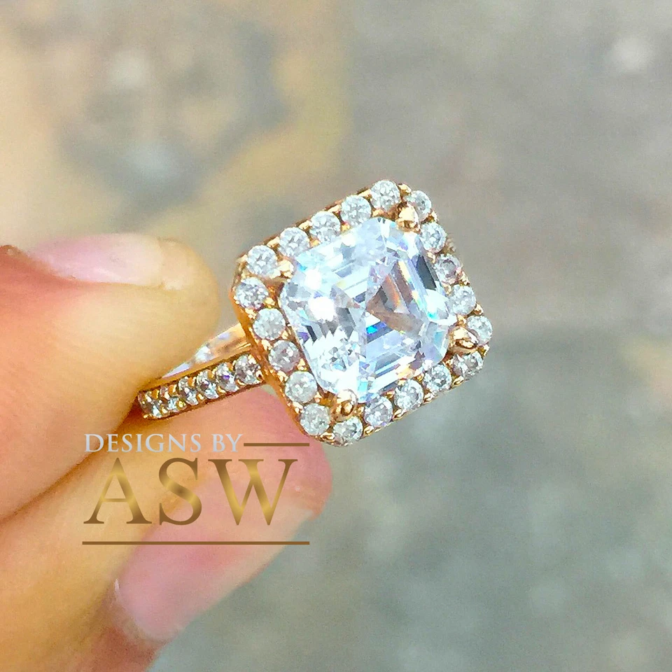 Anillo de compromiso de diamantes simulados de corte Asscher de oro rosa macizo de 14 k con halo de 2,50 quilates Foto 4 de 4