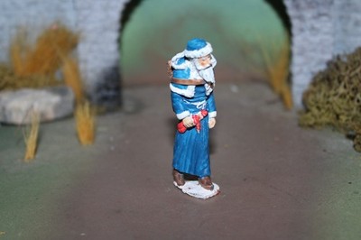 ANTIQUE SANTA CLAUS LEAD FIGURE STANDING TOY IN HAND (SOLID CASTING)