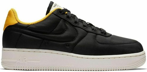 black air force with yellow swoosh