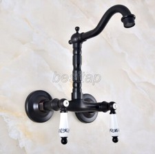 Black Oil Rubbed Brass Bathroom Swivel Spout Faucet Sink Tap Wall Mounted snf833