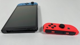 Nintendo Switch OLED Model HEG-001 Handheld Console - 64GB - Neon Red/Neon Blue