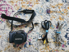 Olympus Stylus SP-560UZ 18x Zoom Digital Bridge Camera 8.0MP