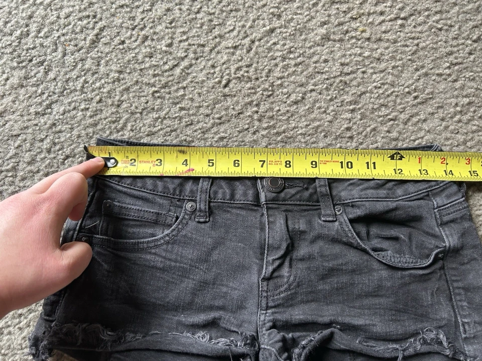 Pantalones cortos negros para mujer American Eagle Outfitters súper bajos talla 4 Foto 3 de 4