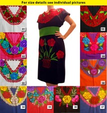 Authentic handmade embroidered ethnic dress from Mexico Chiapas.