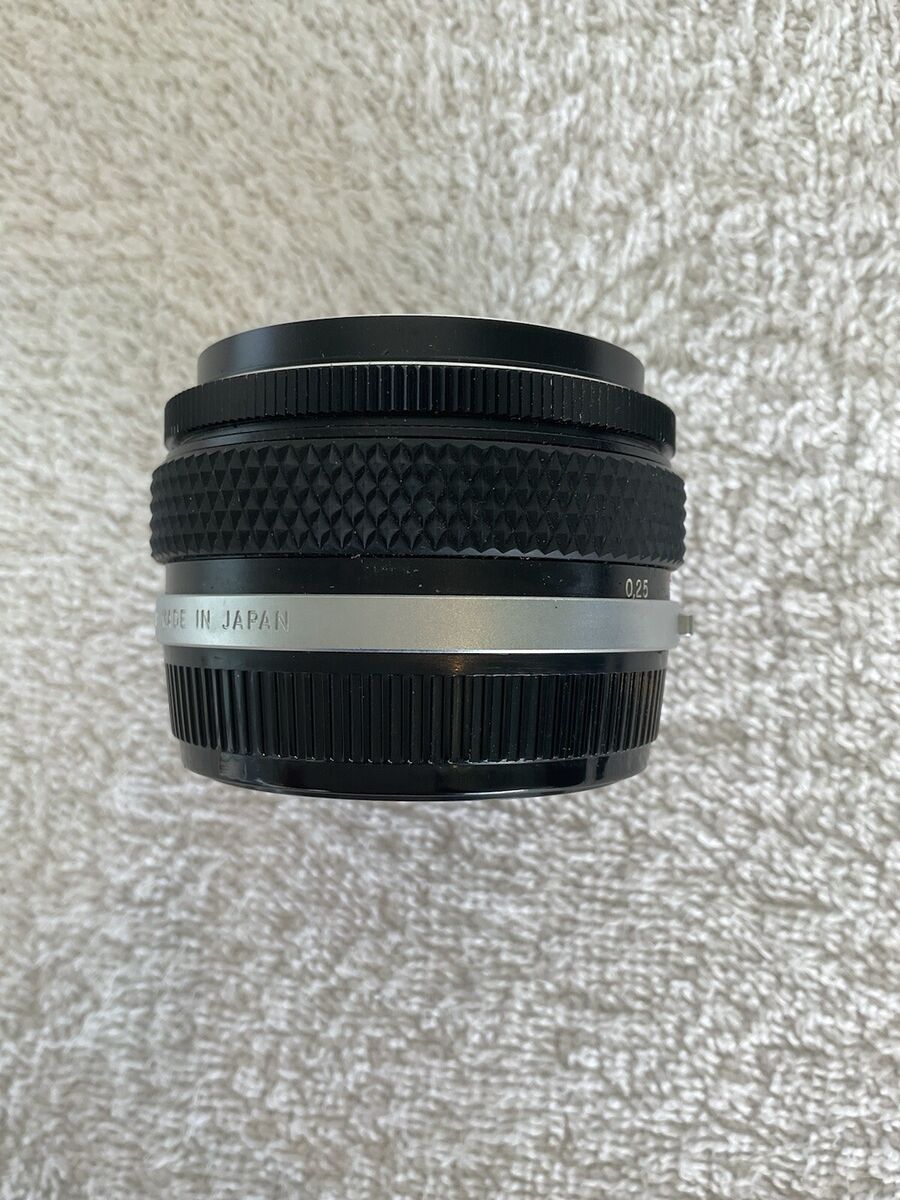 Vintage Olympus OM-System 24mm f2.8 Zuiko Auto-W Camera Lens Vintage Olympus OM-System 24mm f2.8 Zuiko Auto-W Camera Lens