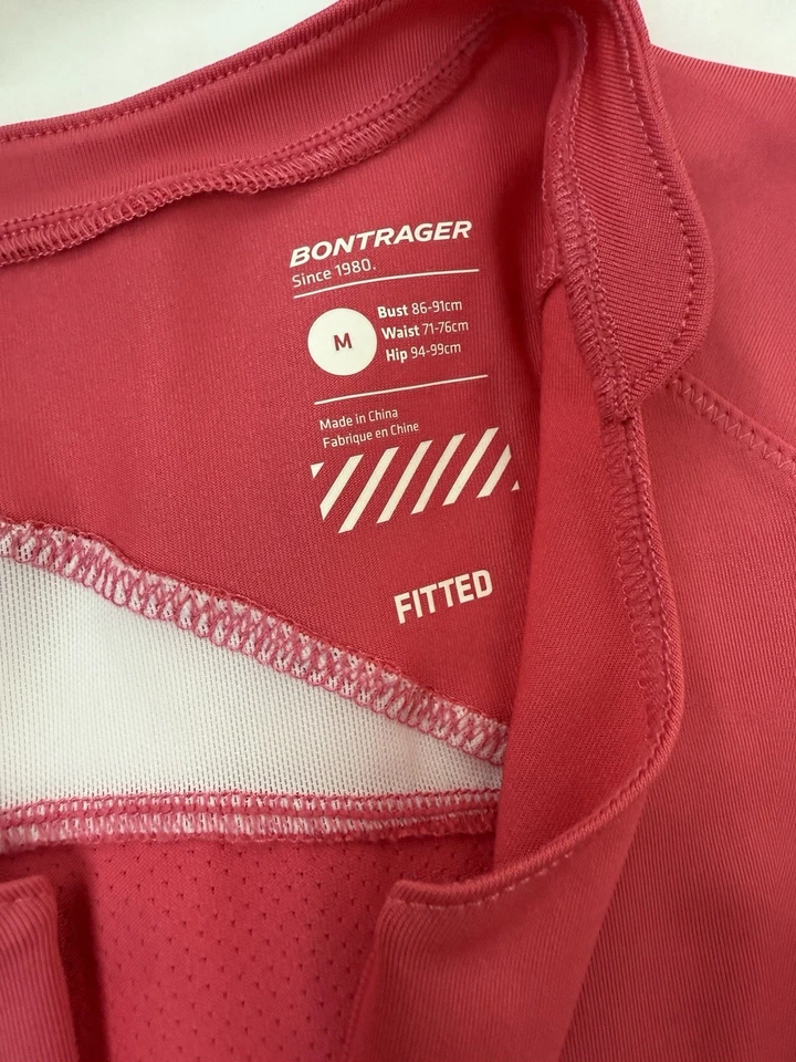 Camiseta de ciclismo Bontrager para mujer Vella calzada mediana 1/2 cremallera rosa sin mangas Foto 3 de 4