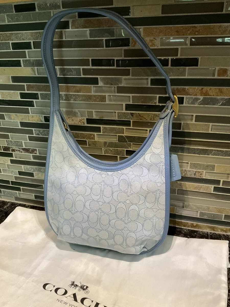 signature coach shoulder bag