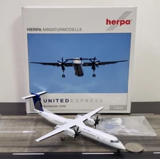 Herpa Wings UNITED EXPRESS Dash 8 Q400 N328NG 1/200